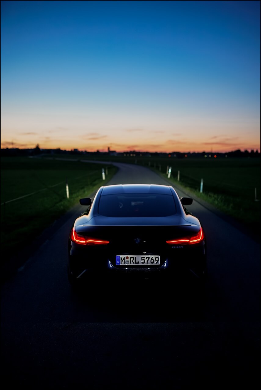 Heckpartie vom BMW 840i in Carbon-schwarz